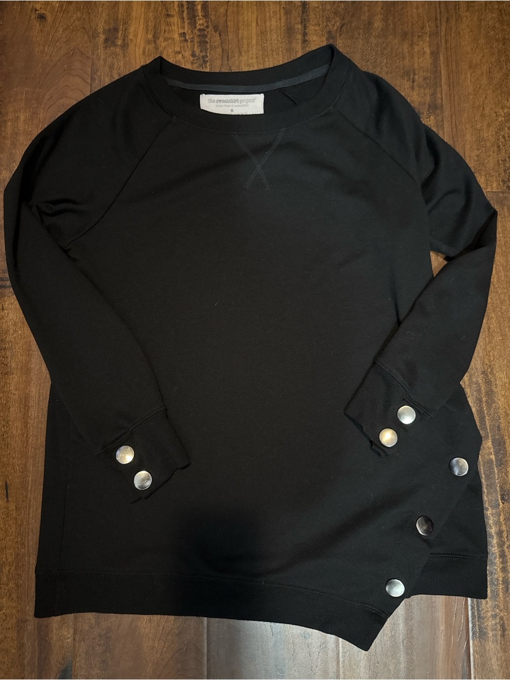 Black Crewneck Sweater with Snap Button Accents
